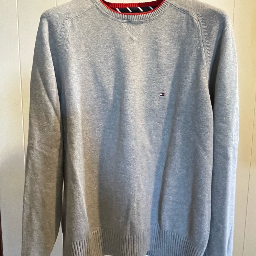 Ken’s Tommy Hilfiger sweater.